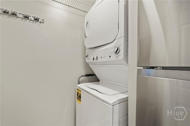 12300 Apache Ave Unit 1719, Savannah, GA 31419 - washroom featuring stacked washing machine and dryer