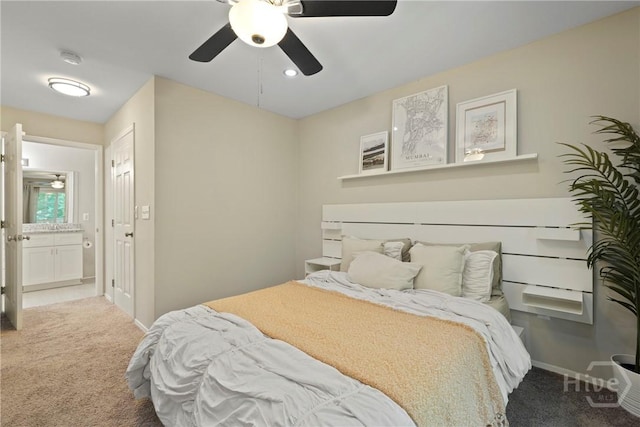 12300 Apache Ave Unit 1719, Savannah, GA 31419 - bedroom with carpet, baseboards, connected bathroom, and ceiling fan