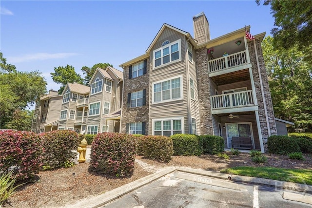 12300 Apache Ave Unit 1719, Savannah, GA 31419 - view of property featuring uncovered parking