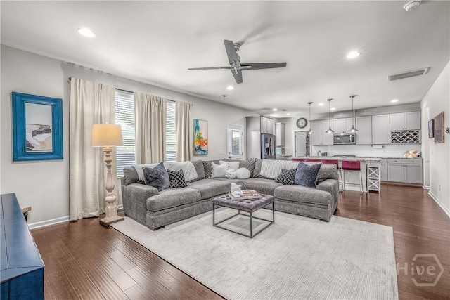 103 Safari Trl, Pooler, GA 31322 - living room featuring dark wood-type flooring, a ceiling fan, recessed lighting, and baseboards