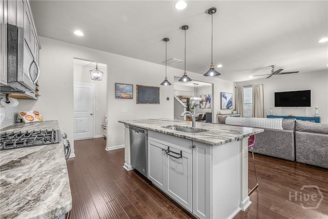 103 Safari Trl, Pooler, GA 31322 - kitchen with a sink, appliances with stainless steel finishes, an island with sink, open floor plan, and ceiling fan