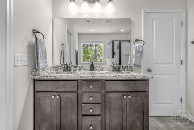 103 Safari Trl, Pooler, GA 31322 - bathroom featuring double vanity and a shower stall