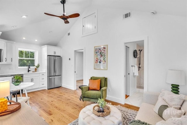 2136 Indiana Ave, Savannah, GA 31404 - living area with high vaulted ceiling, ceiling fan, baseboards, recessed lighting, and light wood-style flooring
