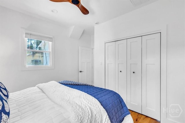 2136 Indiana Ave, Savannah, GA 31404 - bedroom with a closet, wood finished floors, and a ceiling fan