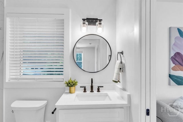2136 Indiana Ave, Savannah, GA 31404 - ensuite bathroom with vanity, toilet, and plenty of natural light