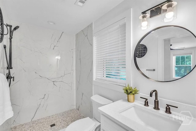 2136 Indiana Ave, Savannah, GA 31404 - bathroom featuring a marble finish shower, vanity, and toilet