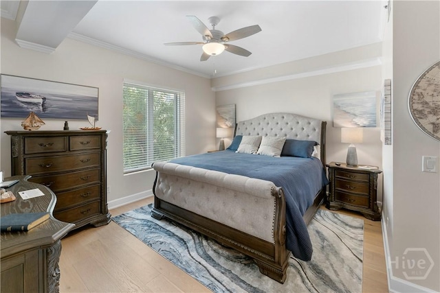700 Wilmington Island Rd Unit 305, Savannah, GA 31410 - bedroom featuring light wood-type flooring, ornamental molding, baseboards, and a ceiling fan