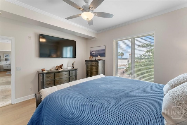 700 Wilmington Island Rd Unit 305, Savannah, GA 31410 - bedroom with light wood finished floors, ornamental molding, baseboards, and ceiling fan