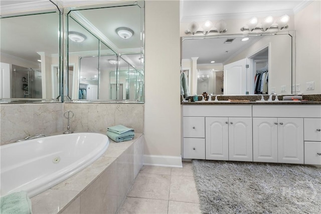 700 Wilmington Island Rd Unit 305, Savannah, GA 31410 - bathroom with ornamental molding, a shower stall, a tub with jets, double vanity, and tile patterned flooring