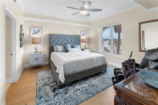 700 Wilmington Island Rd Unit 305, Savannah, GA 31410 - bedroom featuring light wood finished floors, ornamental molding, baseboards, and a ceiling fan