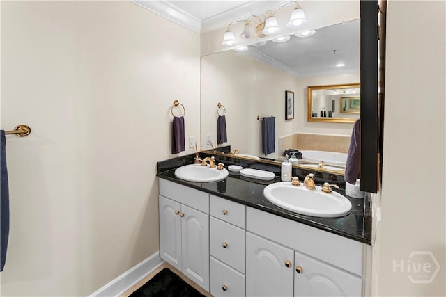 700 Wilmington Island Rd Unit 305, Savannah, GA 31410 - bathroom featuring double vanity, ornamental molding, a garden tub, and baseboards