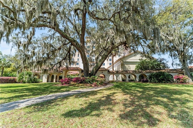 700 Wilmington Island Rd Unit 305, Savannah, GA 31410 - view of front of house featuring a front yard and stucco siding