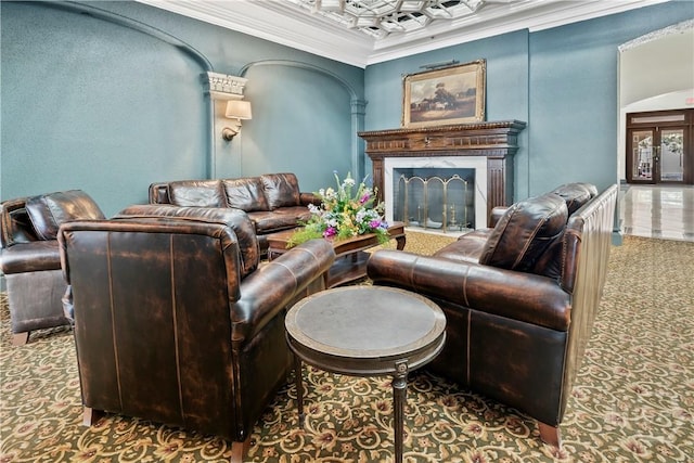 700 Wilmington Island Rd Unit 305, Savannah, GA 31410 - carpeted living room with crown molding and a fireplace