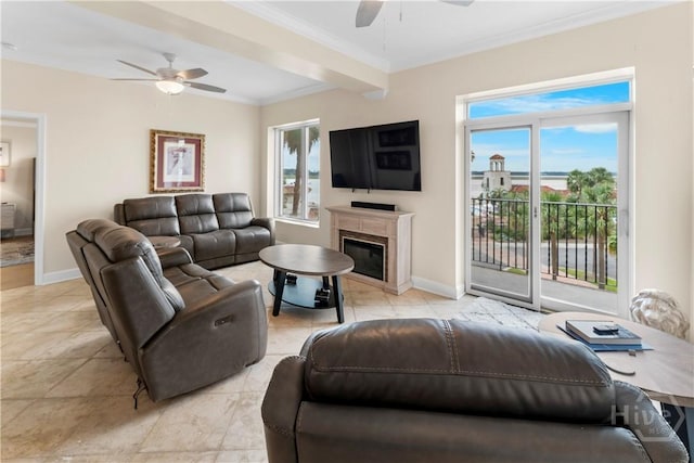 700 Wilmington Island Rd Unit 305, Savannah, GA 31410 - living room featuring ceiling fan, crown molding, a premium fireplace, and baseboards