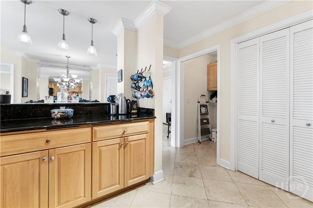 700 Wilmington Island Rd Unit 305, Savannah, GA 31410 - kitchen featuring ornamental molding, light tile patterned floors, a chandelier, hanging light fixtures, and baseboards
