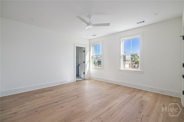 630 Ogeechee Ln, Richmond Hill, GA 31324 - spare room featuring light wood-style floors, a ceiling fan, and baseboards