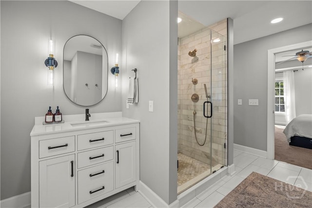 117 Myrtlewood Dr, Guyton, GA 31312 - bathroom with a shower stall, vanity, a ceiling fan, baseboards, and connected bathroom