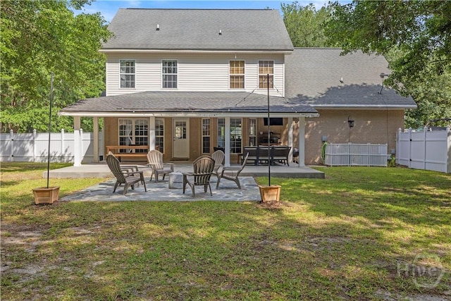 117 Myrtlewood Dr, Guyton, GA 31312 - back of property featuring a patio area, french doors, and a shingled roof