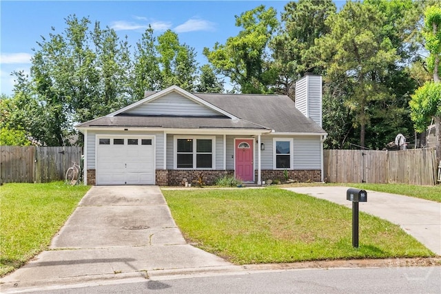 103 Mapmaker Cv, Savannah, GA 31410 - view of front of property with driveway, a chimney, stone siding, an attached garage, and roof with shingles