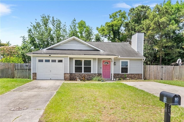 103 Mapmaker Cv, Savannah, GA 31410 - view of front of house with a chimney, concrete driveway, an attached garage, and stone siding