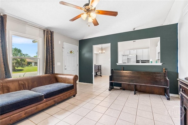 103 Mapmaker Cv, Savannah, GA 31410 - living area featuring vaulted ceiling, ceiling fan, and light tile patterned flooring
