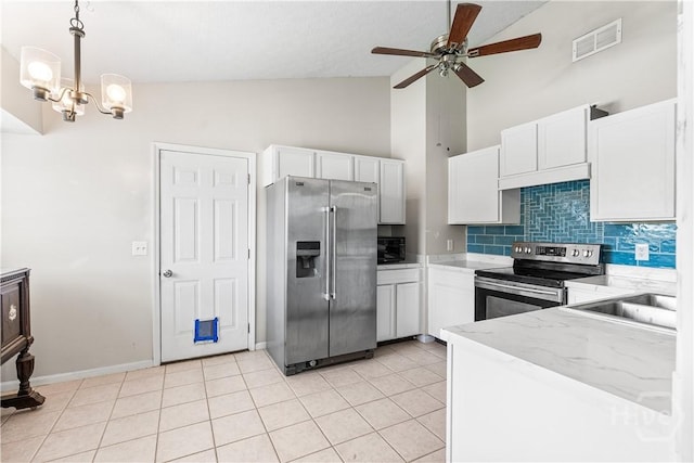 103 Mapmaker Cv, Savannah, GA 31410 - kitchen featuring appliances with stainless steel finishes, ceiling fan, high vaulted ceiling, tasteful backsplash, and white cabinets