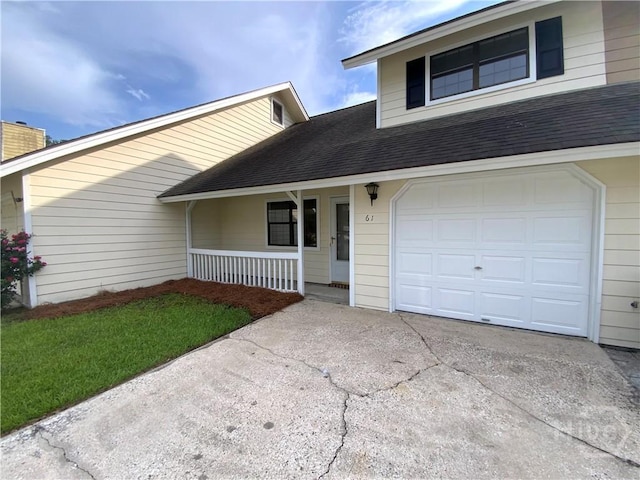 61 Port Dr, Richmond Hill, GA 31324 - view of front facade featuring a porch, roof with shingles, an attached garage, driveway, and a chimney