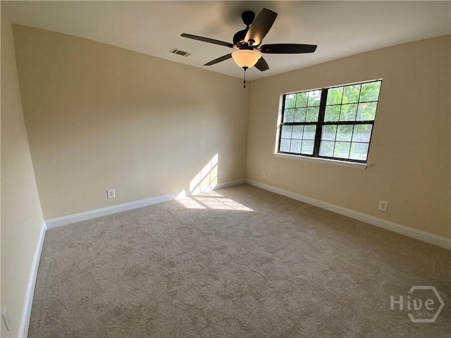 61 Port Dr, Richmond Hill, GA 31324 - carpeted empty room with baseboards and a ceiling fan