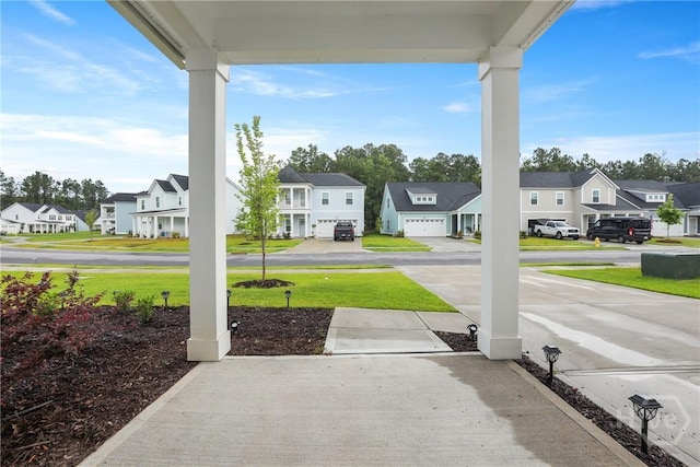 137 Binscombe Ln, Pooler, GA 31322 - porch with a residential view and a lawn
