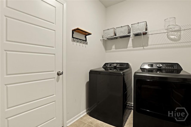 137 Binscombe Ln, Pooler, GA 31322 - laundry area featuring independent washer and dryer, light tile patterned floors, and baseboards