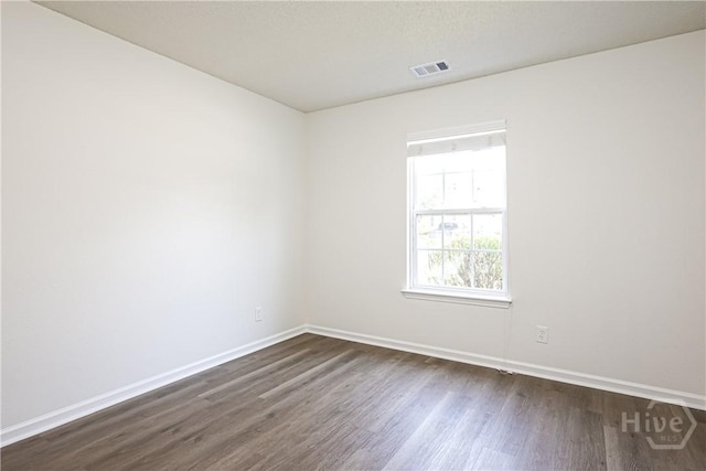 42 Tiller Way, Port Wentworth, GA 31407 - unfurnished room featuring dark wood finished floors and baseboards