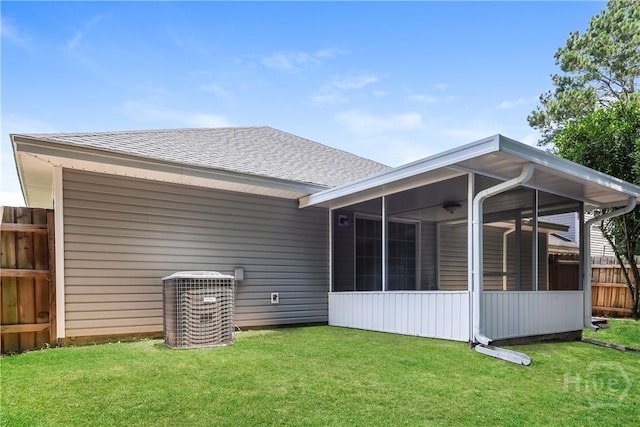 42 Tiller Way, Port Wentworth, GA 31407 - rear view of house with a sunroom and roof with shingles