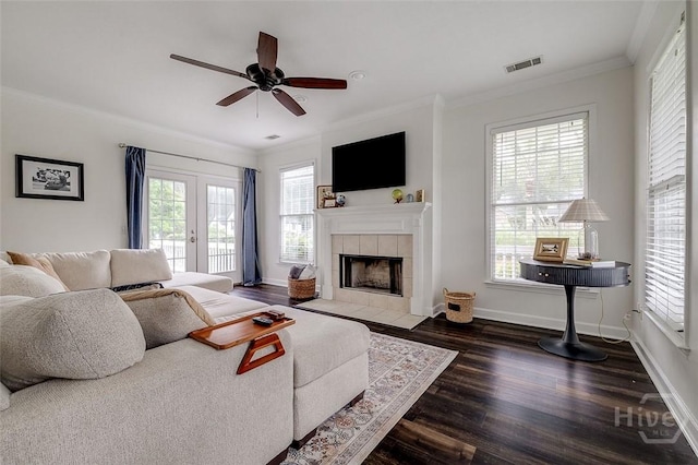 101 Sabal Ln, Savannah, GA 31405 - living area with plenty of natural light, ceiling fan, wood finished floors, ornamental molding, and a fireplace
