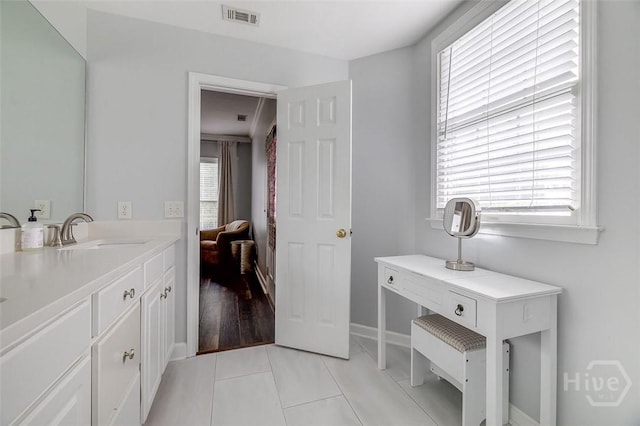 101 Sabal Ln, Savannah, GA 31405 - ensuite bathroom featuring vanity, tile patterned flooring, and baseboards