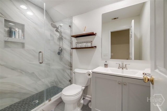 101 Sabal Ln, Savannah, GA 31405 - bathroom with a marble finish shower, vanity, toilet, and tile patterned floors