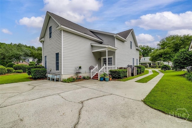 101 Sabal Ln, Savannah, GA 31405 - view of side of property with a yard and concrete driveway