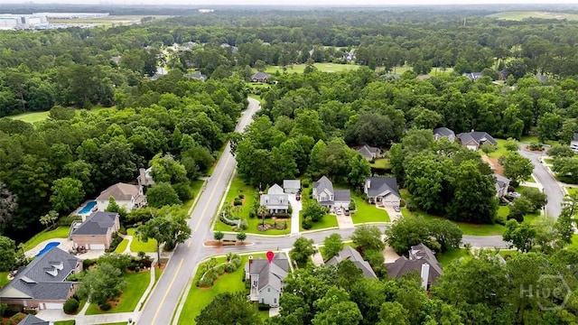 101 Sabal Ln, Savannah, GA 31405 - aerial view of property and surrounding area with nearby suburban area and a heavily wooded area