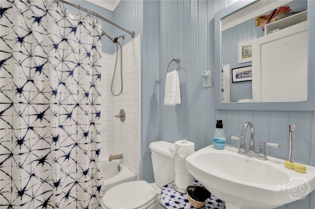 14 Bright St, Tybee Island, GA 31328 - bathroom with a sink, toilet, and shower / bath combination with curtain