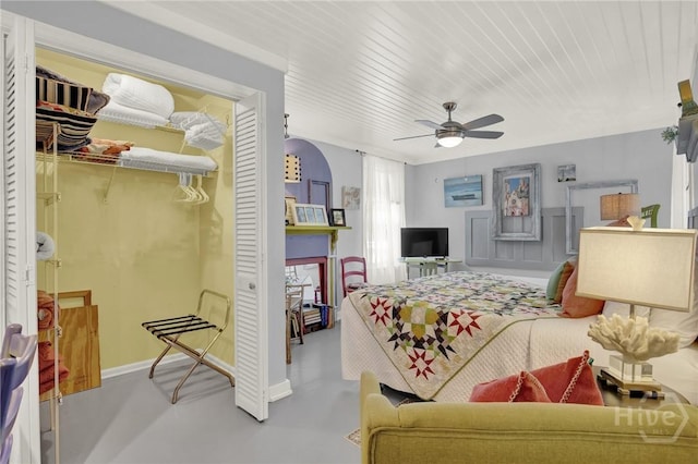 14 Bright St, Tybee Island, GA 31328 - bedroom with concrete flooring, a closet, a ceiling fan, and baseboards