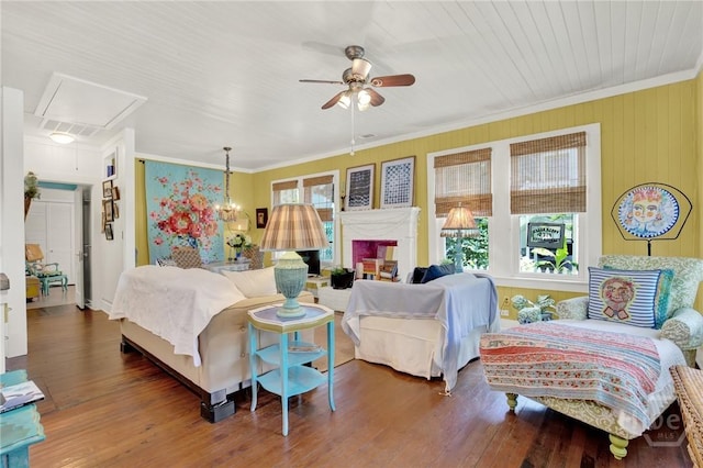 14 Bright St, Tybee Island, GA 31328 - living area featuring attic access, ceiling fan, crown molding, and wood finished floors