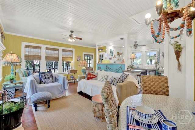 14 Bright St, Tybee Island, GA 31328 - living room featuring a ceiling fan, wood finished floors, crown molding, and wood ceiling