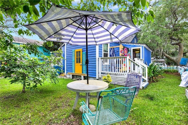 14 Bright St, Tybee Island, GA 31328 - back of property featuring a lawn