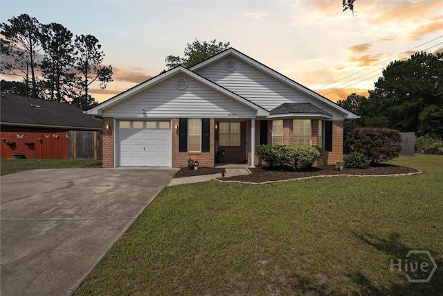 2000 Ossabaw Dr, Hinesville, GA 31313 - single story home featuring brick siding, an attached garage, and concrete driveway
