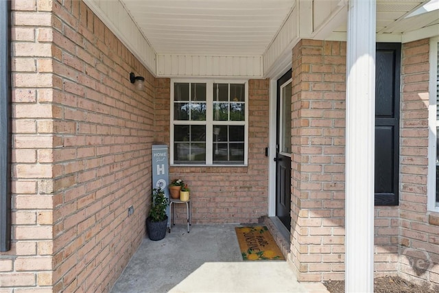 2000 Ossabaw Dr, Hinesville, GA 31313 - view of exterior entry with brick siding and covered porch