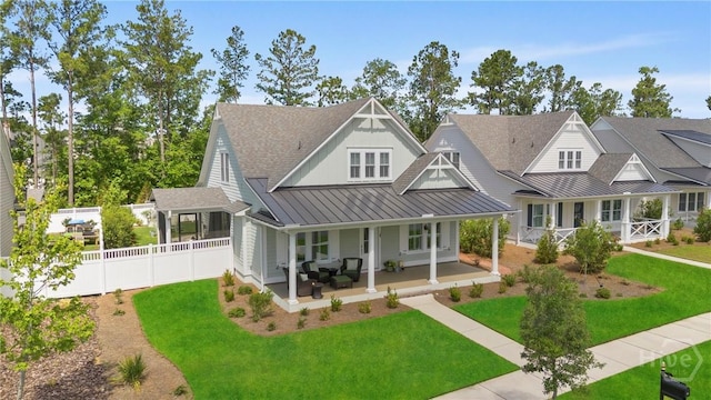117 Quince St, Pooler, GA 31322 - view of front of house with covered porch, a standing seam roof, a shingled roof, and metal roof
