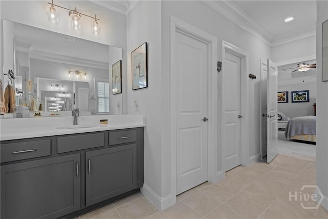 117 Quince St, Pooler, GA 31322 - ensuite bathroom featuring ornamental molding, vanity, ceiling fan, tile patterned floors, and baseboards