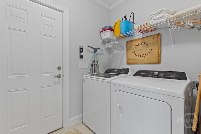 117 Quince St, Pooler, GA 31322 - washroom with washer and clothes dryer, crown molding, baseboards, and light tile patterned floors