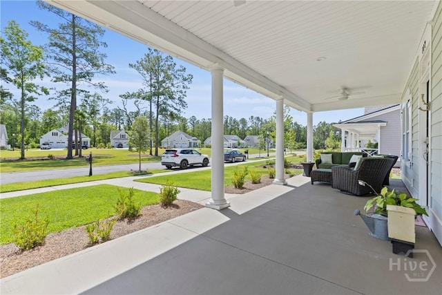 117 Quince St, Pooler, GA 31322 - porch with a lawn, a residential view, outdoor lounge area, and a ceiling fan