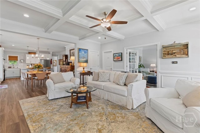 117 Quince St, Pooler, GA 31322 - living area featuring ceiling fan, coffered ceiling, beam ceiling, wood finished floors, and a chandelier