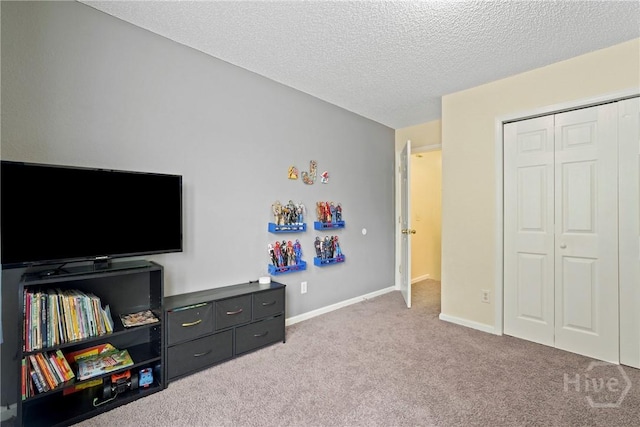 21 Hawser Way, Port Wentworth, GA 31407 - carpeted bedroom featuring a closet, a textured ceiling, and baseboards